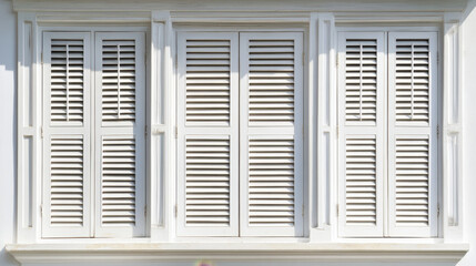 Fototapeta premium Close up of beautiful new white wooden shutters on window, showcasing their elegant design and craftsmanship. shutters enhance aesthetic appeal of building