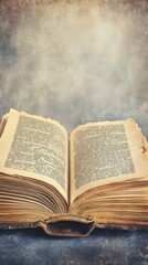 An antique open book with yellowed pages, showcasing vintage text, set against a soft, faded background.