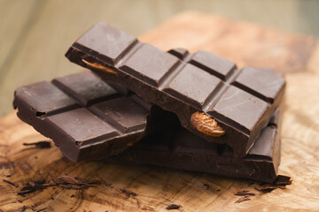 Closeup homemade dark chocolate with almonds