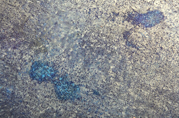 dirty art background of gray stains on blue