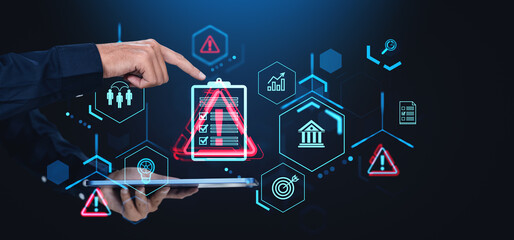 Hand pointing at digital icons representing risk management, safety, and financial planning on a...
