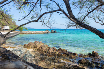 Koh Kham is a small beautiful island in Trat Province Thailand with crystal-clear waters.