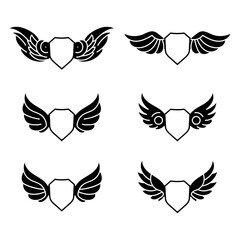 set of shield with wing decorated element vector design illustration	