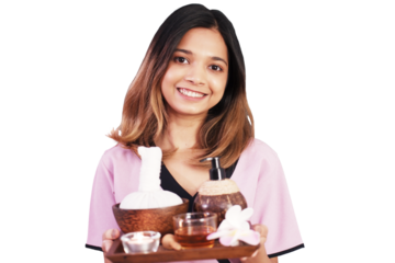 Smiling Professional Asian Thai massage therapist woman holding a herbals tray for therapy at alternative medicine healing spa Center in Thailand clip art and element