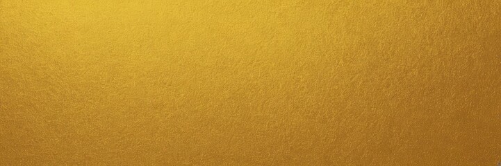 Naklejka premium a close-up of a textured surface with a golden yellow color. The texture appears to be slightly rough, similar to a painted wall or a piece of fabric. There are no distinct patterns or objects visible