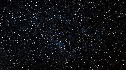 a clear night sky with numerous stars twinkling against a deep black background,