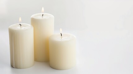Christmas Candles Isolated on White Background - A Symbol of Holiday Warmth and Celebration. The Glowing Candles, with Their Flickering Flames, Standing Out Against the Purity of White. Their Soft Lig