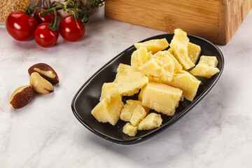 Crushed parmesan cheese in the bowl