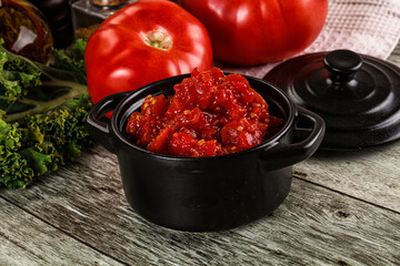 Diced ripe tomato with sauce