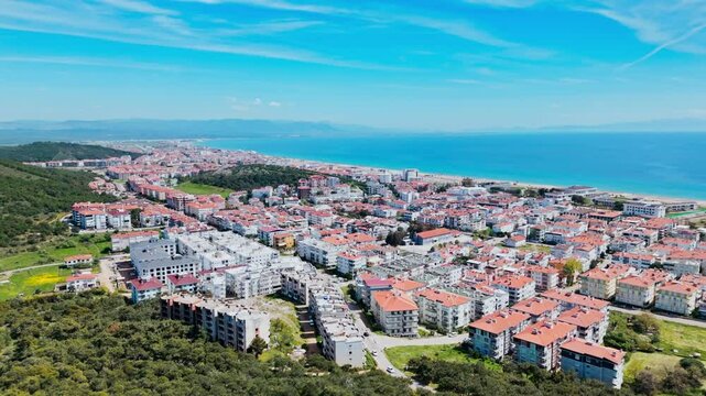 Panoramic view of a residential area in Ayvalik, a seaside resort town on the Aegean coast. Cozy homes and Mediterranean scenery from above