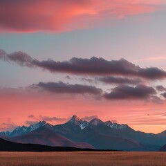 A beautiful landscape image of a mountain range at sunset