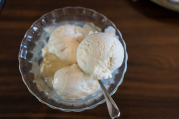 Coconut ice cream. Sweet coconut ice cream in a glass bowl. Coconut ice cream is very popular dessert in Thailand.