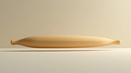 Fototapeta premium Light wood rolling pin on white surface.