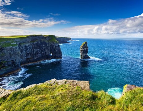 view on stunning dun briste sea stack in downpatrick head ireland popular travel and tourist area with stunning scenery famous irish landmark warm sunny day with blue cloudy sky