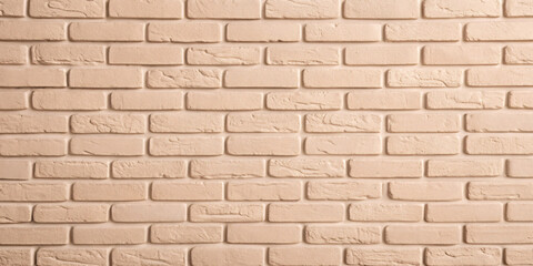 Obraz premium Wide cream brick wall with beige, old brown brick and limestone textures, perfect for abstract backgrounds