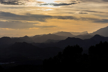 Obraz premium sunset over the mountains