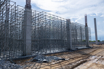 High scaffolding structure under construction beams