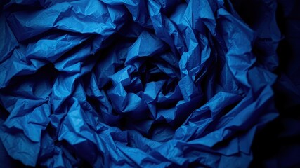A Close Up of a Deep Blue Crumpled Fabric, Creating a Textured Background for Graphic Design and Abstract Art.