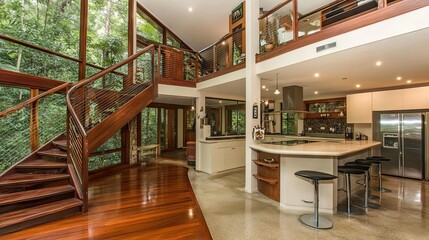 Stylish kitchen with smooth white cabinets, concrete flooring, and bold black bar stools