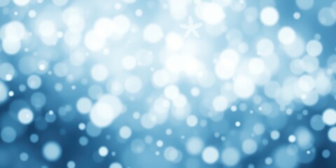 Fototapeta premium Abstract blue and white bokeh background with delicate sparkling lights and a soft focus effect
