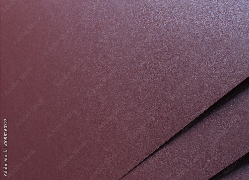 Poster metallic burgundy paper background with smooth, shimmering lines and a glossy yet matte refined surf
