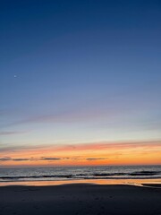 Obraz premium sunset at the beach in the summer