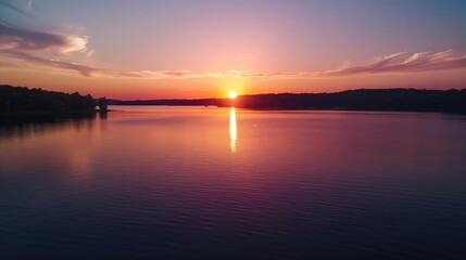 Obraz premium Tranquil Sunset Over Serene Lake