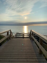 Obraz premium wooden pier at sunset