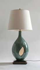 Sophisticated luxury lamp with black wooden base, jade ceramic body, and white elegant shade