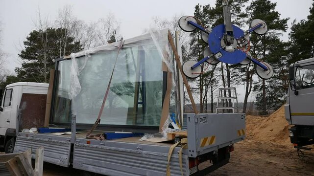 Window frames are being prepared for installation.
