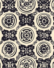 Obraz premium A detailed pattern featuring intricate designs and motifs in contrasting colors, perfect for backgrounds or textile applications.