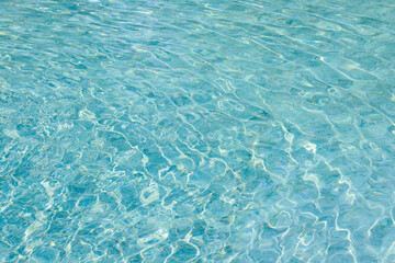 Obraz premium abstract blue color water wave in swimming pool pure natural swirl pattern texture