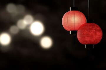 Obraz premium Two red lanterns hang against a blurred background of soft lights, creating a warm and inviting atmosphere.