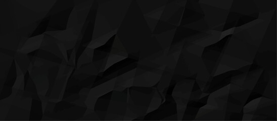 Obraz premium Black crumpled paper texture background. Crumpled paper ball isolated on black with clipping path. panorama grunge wrinkly paper texture background, crumpled pattern texture. paper crumpled texture.