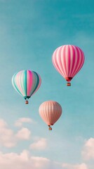 Obraz premium Colorful hot air balloons floating in the sky during a vibrant morning