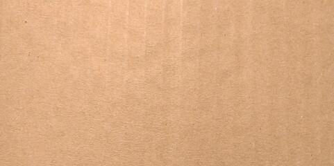 Fototapeta premium Brown paper texture background. Background and texture made of recycled paper. Cardboard.