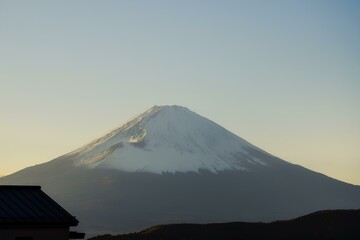 Mt. Fuji bathed in the golden glow of a stunning sunse