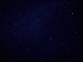 Fototapeta premium Mystical night sky with dark blue frame and glittering stars, shimmering pixels, evening sky, glitter bokeh