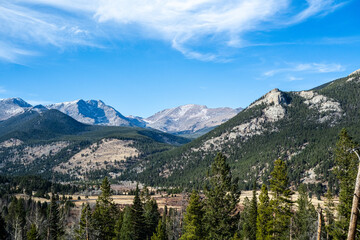 Obraz premium The Rocky Mountain National Park, Colorado , USA in November with smoke rising from controlled fires