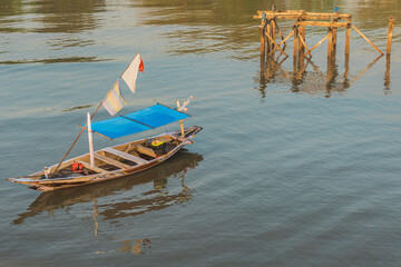 Boats floating at foreshore. taken at Kenjeran beach, Surabaya, east Java, Indonesia
