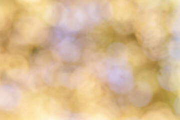 Abstract, defocused and blurry bokeh background. Warm, golden color tones. Diffuse light...