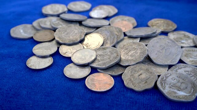 Close shots of old Indian coins of five ten and twenty paisa 1