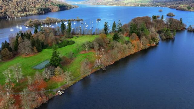 Aerial video showing Belle Isle in Wendemire Lake - Cumbria, UK. 