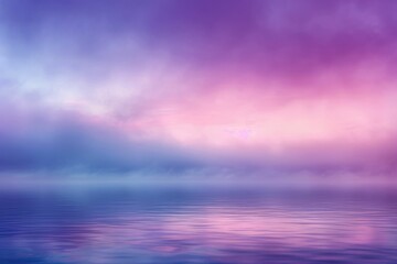 Obraz premium Serene pastel sunrise over calm water misty fog ethereal beauty.
