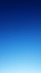 A simple, clear blue sky, perfect for adding a touch of tranquility to your designs.