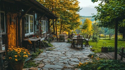 Fototapeta premium Charming Outdoor Cafe Surrounded by Lush Greenery with Rustic Barn Aesthetic and Inviting Seating for Relaxing Gatherings