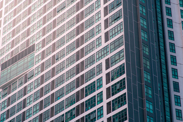 Obraz premium Modern building with blue windows close up