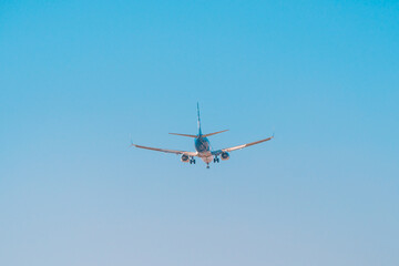 San Diego, USA, 2018. Airliner in blue sky. Travel, air transportation concept