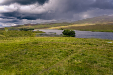 Driving on the scenic route North Coast 500, Scotland, near Loch Droma