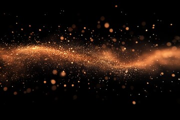 A dark background covered in gold dust particles